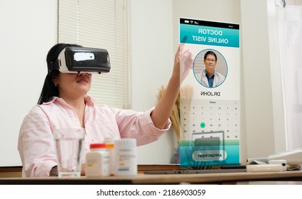 Asian Woman Telemedicine Doctor Online Visit With Virtual Reality Technology Vr Glasses At Home