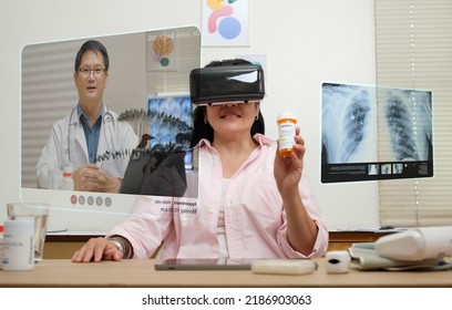 Asian Woman Telemedicine Doctor Online Visit With Virtual Reality Technology Vr Glasses At Home