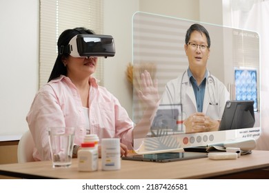 Asian Woman Telemedicine Doctor Online Visit With Virtual Reality Technology Vr Glasses At Home