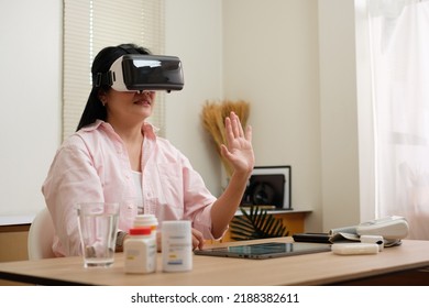 Asian Woman Telemedicine Doctor Online Visit With Virtual Reality Technology Vr Glasses At Home