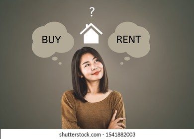 Asian Woman Thinking Buy Or Rent Home Concept With Question Mark In Background  