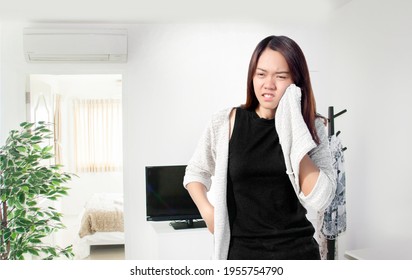 Asian Woman Tired Action And Hot Temperature In Room At Summer