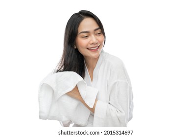 Asian Woman In Towel Drying Her Long Hair With A Towel After Bathing On A Gray Background