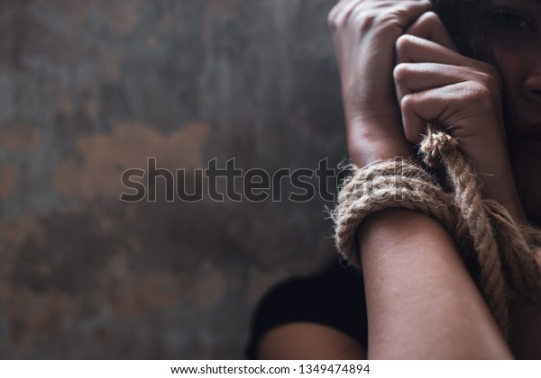 Asian woman trafficking, kidnap or abduct.
Detainees was tied rope at arms. She get hopeless, depressed.
Detainee was detain and hidden by human traffickers. She detain
alone in dirty room copy
space