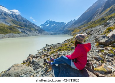 Asian Woman Travel Enjoy At Mt Cook National Park In South Island New Zealand, Concept Of Woman Solo Travel And Relaxation Moment