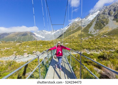 Asian Woman Travel Enjoy At Mt. Cook National Park In New Zealand, Concept Of Woman Solo Travel And Relaxation Moment