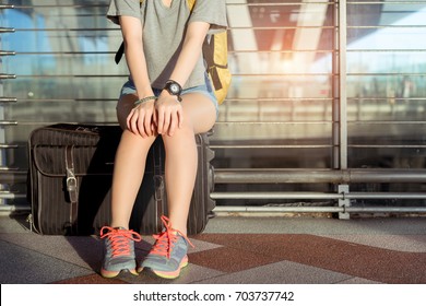 Asian Woman Traveler With Carrying Suitcase Luggage And Passenger For Tour Travel Booking Ticket Flight In Airport International Waiting Friend Siting Relax