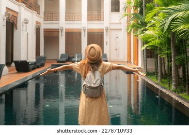 Asian woman traveller relax in resort and swimming pool in Hotel in Chiangmai, Thailand - Shutterstock ID 2278710933
