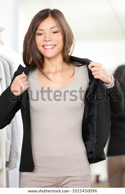 Asian Woman Trying On New Black Stock Photo Edit Now