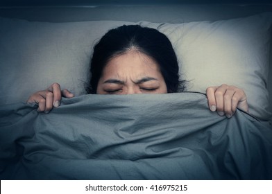 Asian Woman Unable To Fall As Sleep In The Night Time. Asian Girl Having Trouble With Getting Up Early In The Morning, Nightmare.