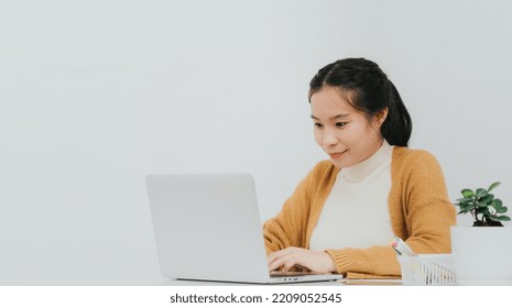 Asian Woman Use Computer For Work In Office, Business Woman 