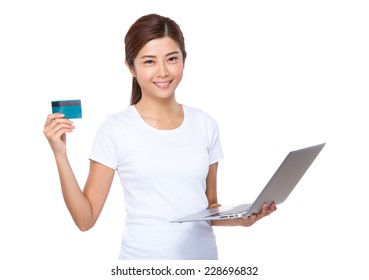 Asian Woman Use Credit Card For Online Shopping