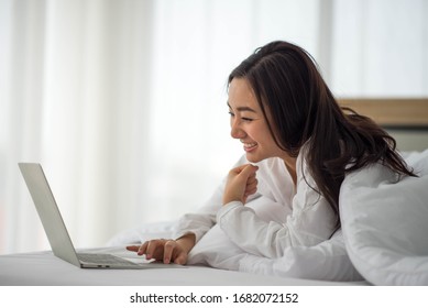 Asian Woman Use Notebook Laptop Work From Home 