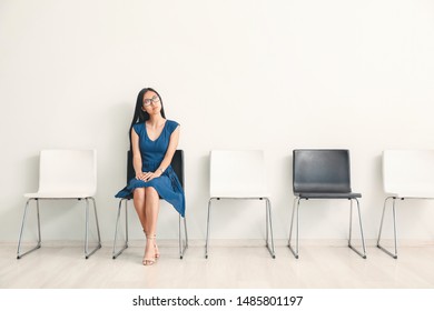 Asian woman waiting for job interview indoors - Shutterstock ID 1485801197