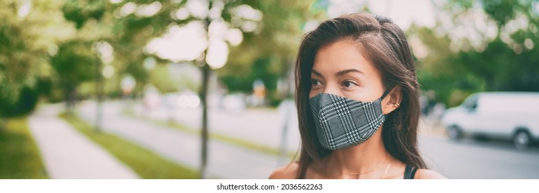 Asian Woman Walking Outside Wearing Stylish Fashion Cloth Face Mask In Plaid Pattern. Serious Young Ethnic Model Portrait Banner Panorama.