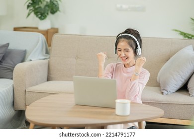 Asian Woman Watching Movies, Listening To Music, Video Calling At Home.