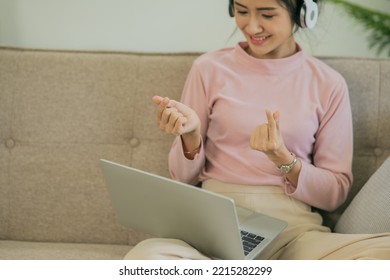 Asian Woman Watching Movies, Listening To Music, Video Calling At Home.