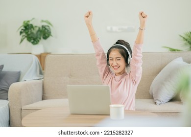 Asian Woman Watching Movies, Listening To Music, Video Calling At Home.