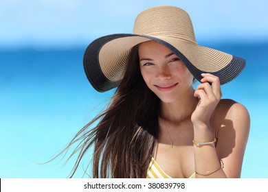 Asian Woman Wearing Fashion Straw Beach Hat For Skin Care Sun Protection. Face Skincare Beauty Concept. Beautiful Chinese Caucasian Mixed Race Young Adult Girl Portrait On Summer Vacation Travel.