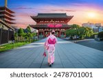 Asian woman wearing japanese traditional kimono at Temple in Tokyo, Japan.