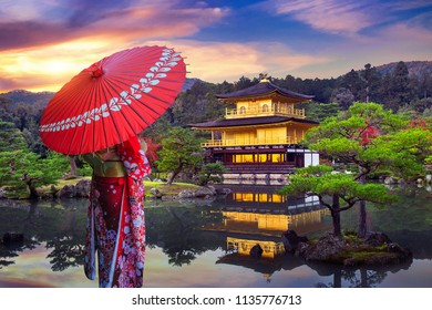 Asian woman wearing japanese traditional kimono at golden pavilion. Kinkakuji Temple in Kyoto, Japan. - Powered by Shutterstock