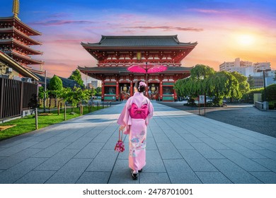 Asian woman wearing japanese traditional kimono at Temple in Tokyo, Japan. - Powered by Shutterstock