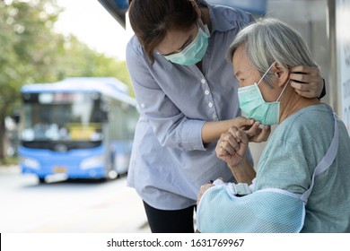 Asian Woman Wearing Medical Face Mask For Senior Person Because Sick Female Elderly With Cough And Fever,prevent Spread Of Germs To Other People At Bus Stop, Coronavirus,MERS-CoV,Wuhan Virus 2019-nCoV