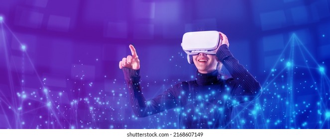 Asian Woman Wearing VR Headset For Entertainment In The Metaverse. Augmented Reality. Future Digital Technology Game And Entertainment. Metaverse Technology Concept. 