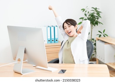 Asian Woman Working In Office