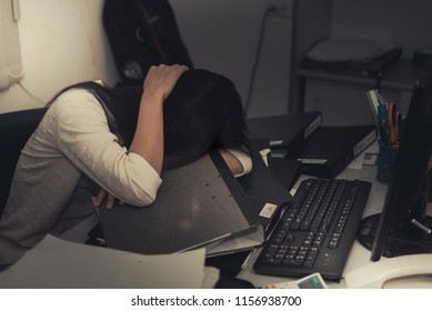 Asian Woman Working In Office,young Business Woman Stressed From Work Overload With A Lot File On The Desk,Thailand People