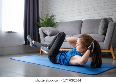 Asian Woman Workout From Home, Her Sit Up.