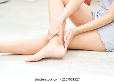 Asian Woman's Body Care Of Her Heel