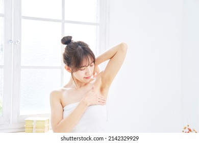 Asian Woman's Body Care Of Her Armpit