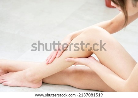 Asian woman's foot care at home