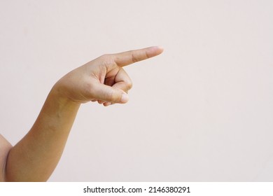 Asian Woman's Hand Pointing Forward