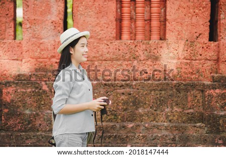 Asian women be smile with camera Travel Holiday Relaxation Concept