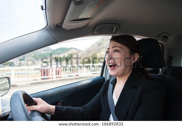 Asian women to drive in\
suit