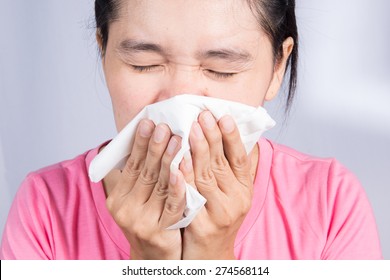 Asian Women Have Cold And Nasal Congestion.