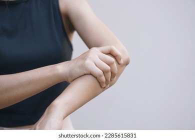 Asian women have muscle weakness and numbness in their arms.