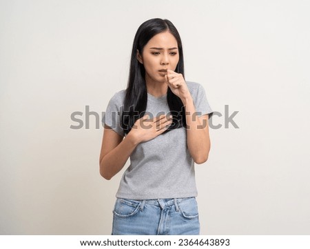 Asian Women have throat irritation mucus and coughing. Fever headache respiratory tract infection. Female unhealthy Sickness need to consult a doctor and get treatment. On isolated white background.
