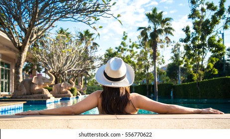 Asian Women In Luxury Near Home, Spa Lifestyle Resort Near The Swimming Pool Hotel Island, Relax And Happy.  Summer Concept