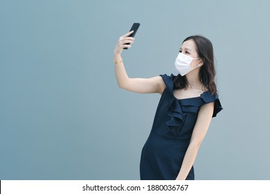 Asian Women Selfie With Face Mask