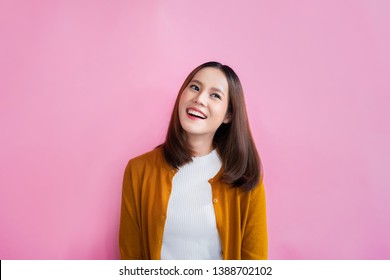 Asian Women She Is Refreshing She Is Looking Left. In Background Studio