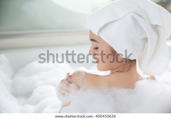 Asian Women Are Shower In Bathtub 