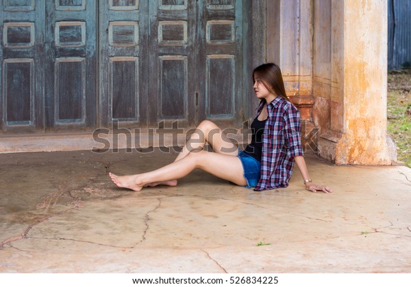 Asian Women Sitting Comfortably Relaxed On Stock Photo Edit Now