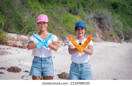 Asian Women In Summer Dresses ,hat And Color Gloves With Her Arms Crossed In Front Of Her Chest Break The Bias Symbol Solidarity, Breaking Stereotypes, Inequality Of Woman's International Day.