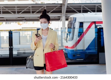 Asian women Thai people shopping in malls on vacation live a new normal in the capital travel in the capital Epidemic Prevention in Bangkok, Thailand