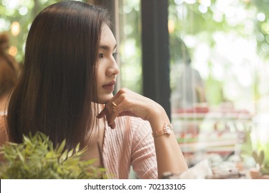 Asian Women Thinking About Or Missing Passed Good Memory In Cafe