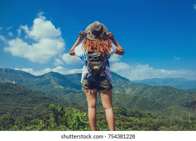 Asian Women Travel Relax In The Holiday. Stand Natural Mountain Experience. Stand Touch Mountain Nature. Thailand