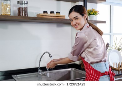 Asian Women Wash Hands To Prepare Food For The Family As Breakfast For The Weekend, Washing Your Hands Before Cooking Is Necessary Because Your Hands Are The Source Of Many Germs.